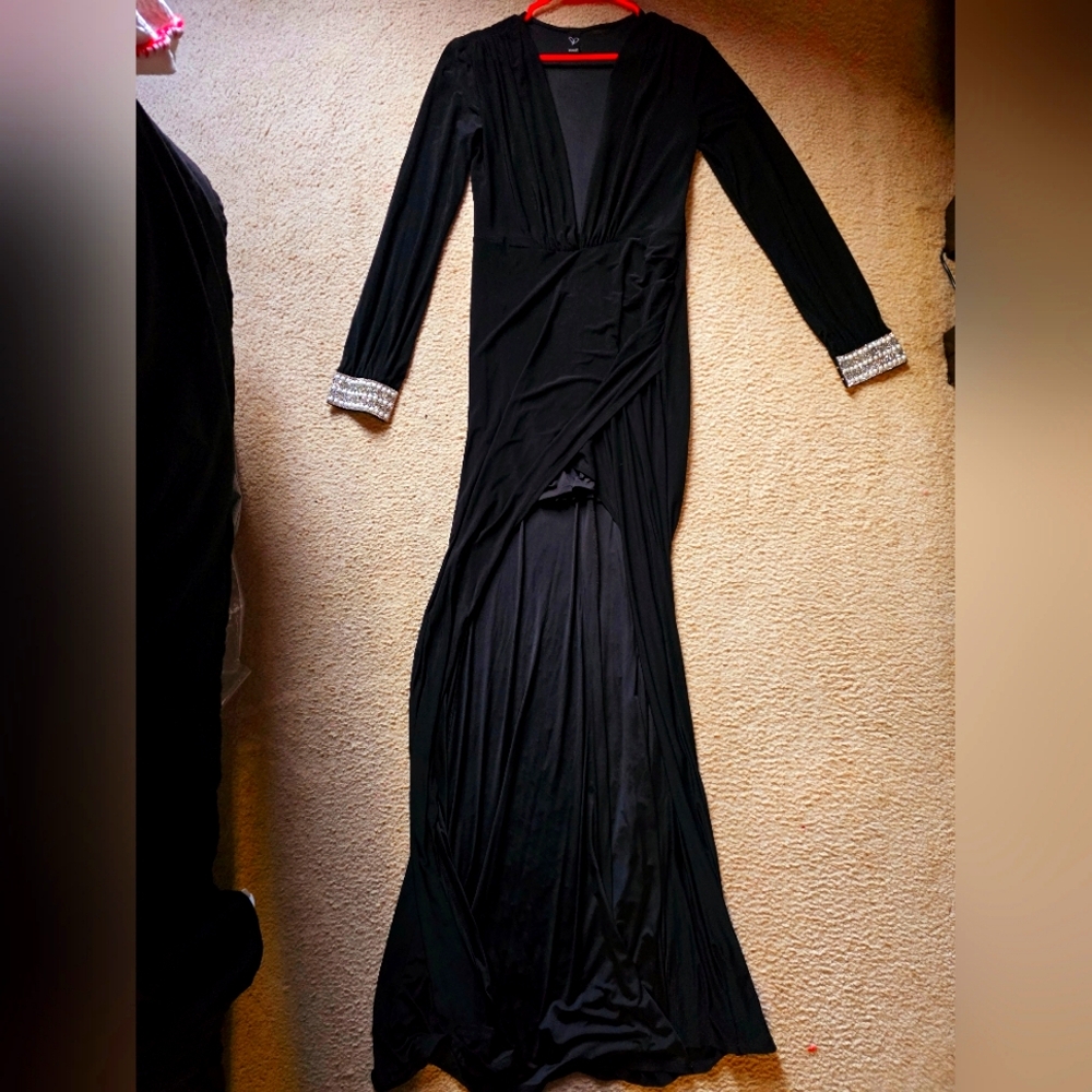 Black low v cut maxi dress with a front slit, jewel cuffs